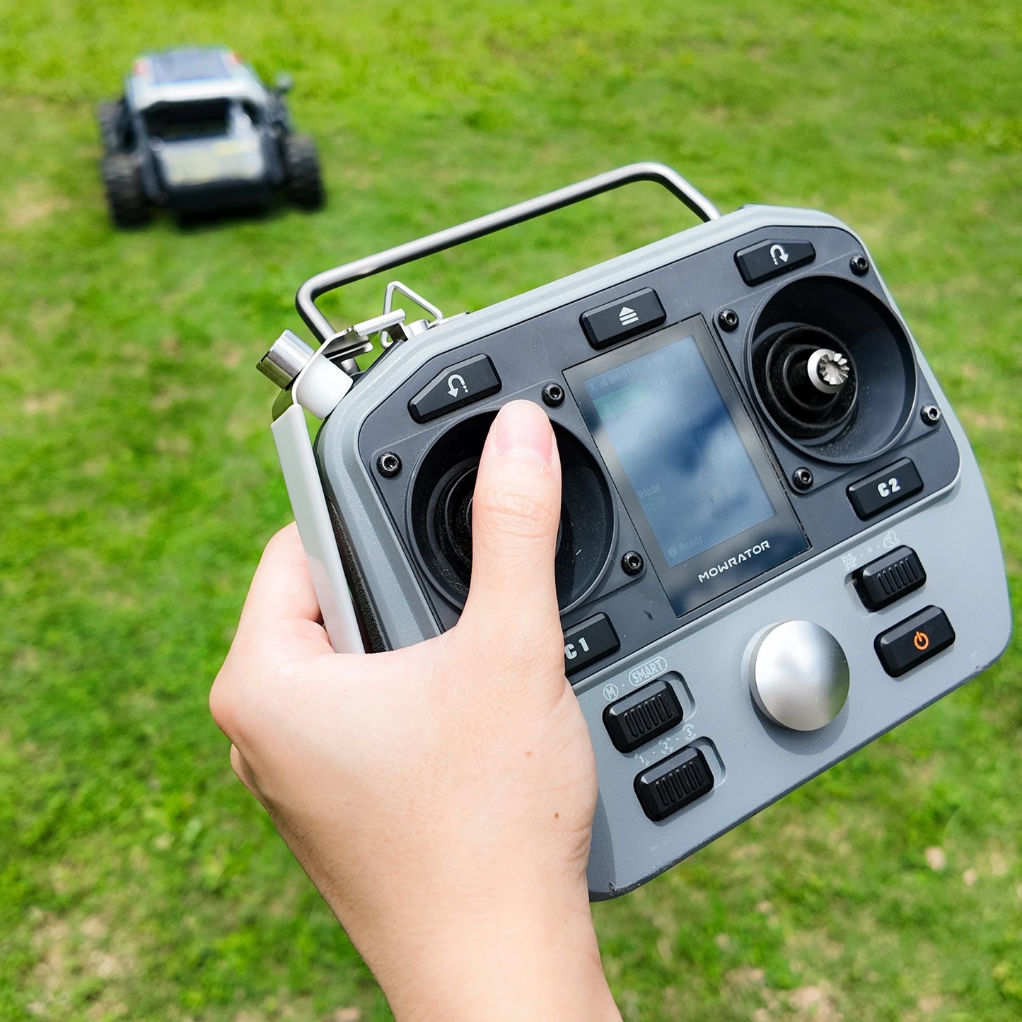 mowrator grip holder for remote button