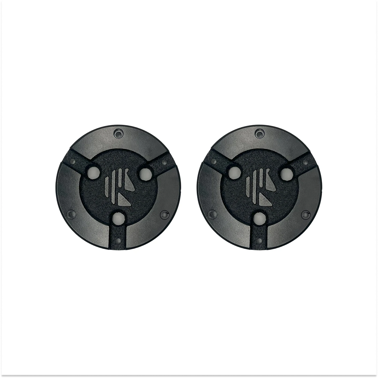 pair of metal hubcaps